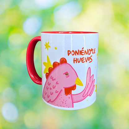 Taza Poniéndole Huevos