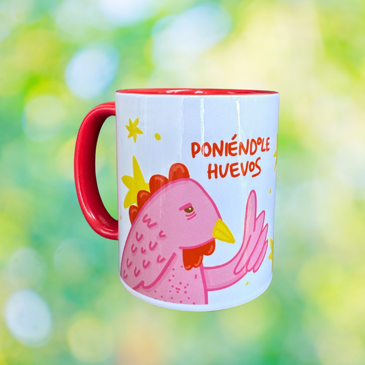 Taza Poniéndole Huevos